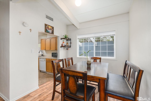 11420 Rocky Mountain St, Reno, NV 89506 - dining area featuring light wood-style flooring and baseboards