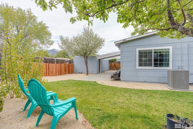 11420 Rocky Mountain St, Reno, NV 89506 - view of yard with central air condition unit and a patio