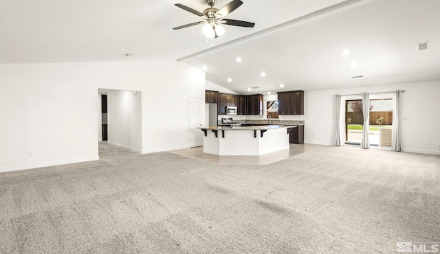 1132 Alder Walk Way, Sparks, NV 89441 - unfurnished living room with light colored carpet, ceiling fan, baseboards, recessed lighting, and high vaulted ceiling