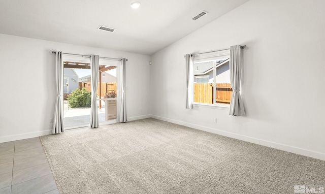1132 Alder Walk Way, Sparks, NV 89441 - tiled spare room with plenty of natural light, baseboards, carpet flooring, and lofted ceiling