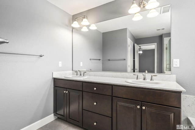1132 Alder Walk Way, Sparks, NV 89441 - bathroom with double vanity, baseboards, and tile patterned floors