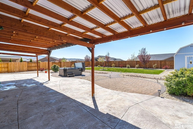1132 Alder Walk Way, Sparks, NV 89441 - view of patio / terrace featuring a hot tub, a storage shed, and an outbuilding