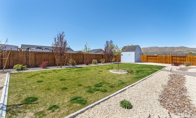 1132 Alder Walk Way, Sparks, NV 89441 - view of yard featuring an outbuilding, a shed, and a mountain view