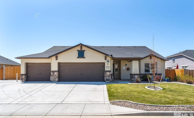1132 Alder Walk Way, Sparks, NV 89441 - view of front facade featuring an attached garage, stucco siding, driveway, and stone siding