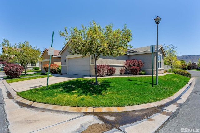 1717 Burwood Cir, Reno, NV 89521 - obstructed view of property with driveway, a front lawn, an attached garage, and stucco siding
