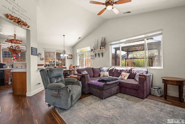 1717 Burwood Cir, Reno, NV 89521 - living area featuring a chandelier, dark wood finished floors, lofted ceiling, and a ceiling fan