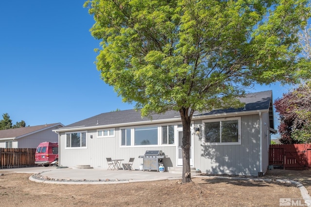 2765 Erin Dr, Sparks, NV 89436 - rear view of house with a patio and entry steps