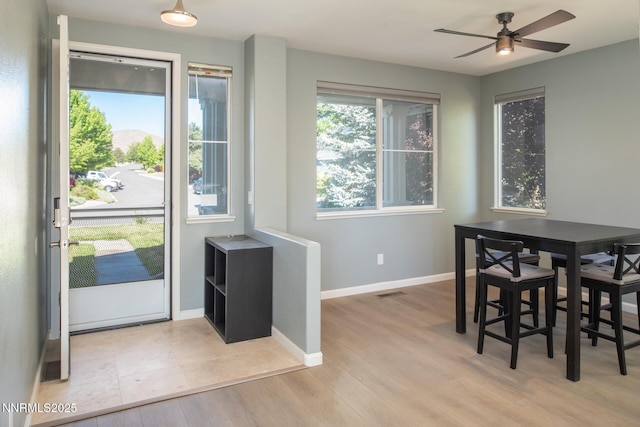 2765 Erin Dr, Sparks, NV 89436 - dining space with a ceiling fan, baseboards, and wood finished floors