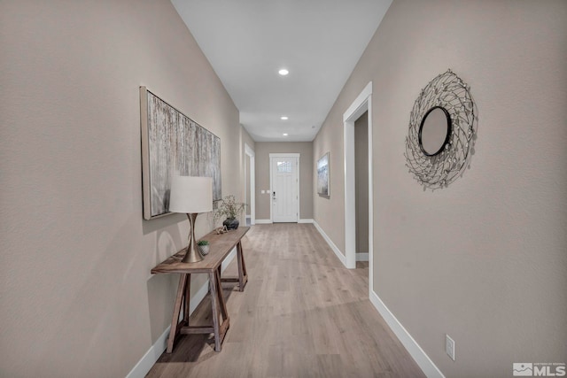 698 Sage Grouse Lp, Gardnerville, NV 89460 - doorway featuring baseboards, light wood finished floors, and recessed lighting