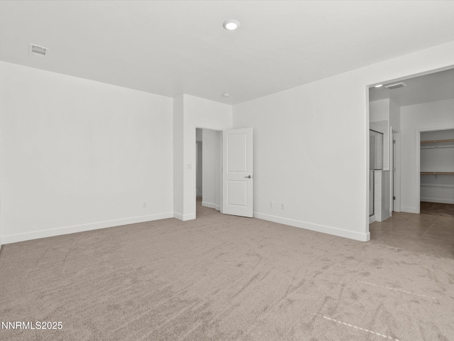 6813 Rivaldo, Sparks, NV 89436 - unfurnished bedroom featuring carpet floors, a spacious closet, baseboards, and a closet