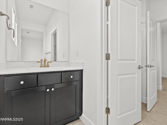 6813 Rivaldo, Sparks, NV 89436 - bathroom featuring vanity, tile patterned floors, and baseboards