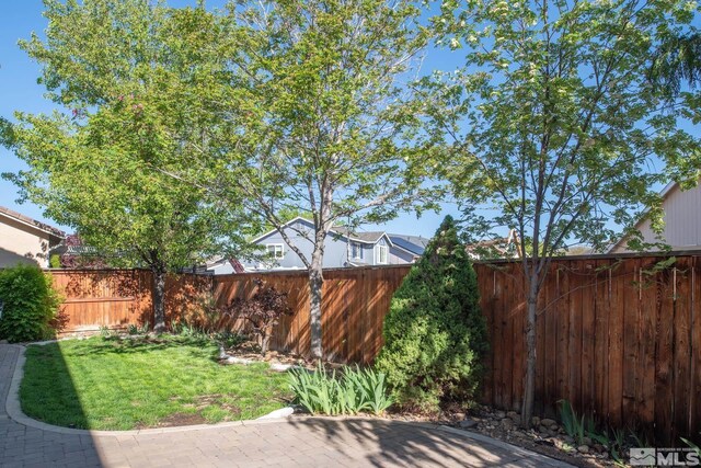 1304 Lambrusca Dr, Sparks, NV 89436 - view of yard featuring a patio