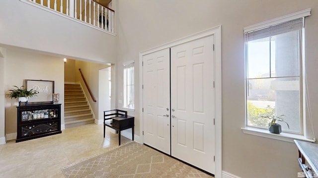 1304 Lambrusca Dr, Sparks, NV 89436 - foyer featuring stairs, baseboards, and light tile patterned flooring
