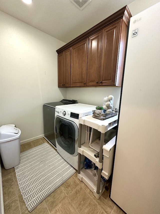 1304 Lambrusca Dr, Sparks, NV 89436 - laundry room featuring cabinet space and washer and dryer