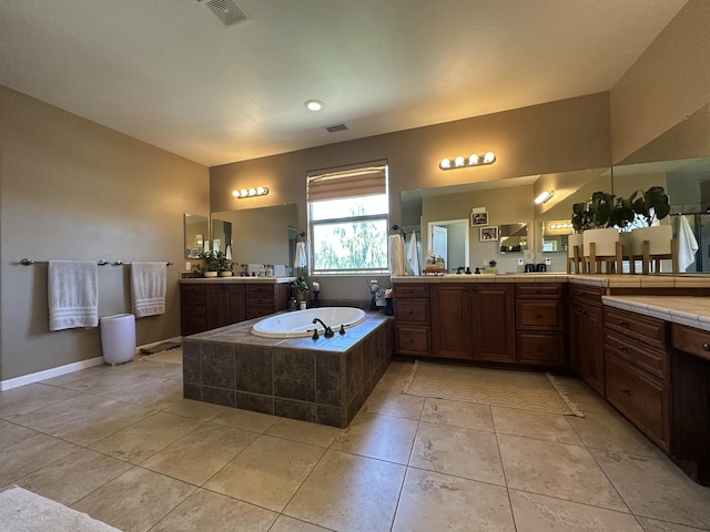 1304 Lambrusca Dr, Sparks, NV 89436 - bathroom with a bath, tile patterned floors, and two vanities
