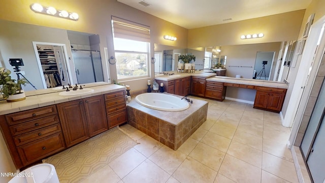 1304 Lambrusca Dr, Sparks, NV 89436 - bathroom with a shower stall, a bath, vanity, and tile patterned flooring