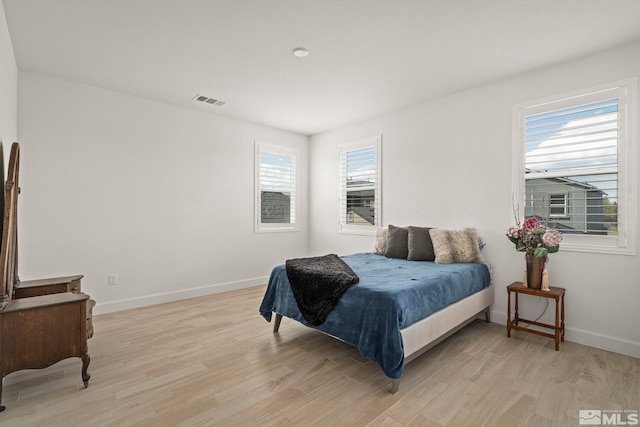 606 Braided Rope Dr, Reno, NV 89511 - bedroom featuring light wood finished floors and baseboards