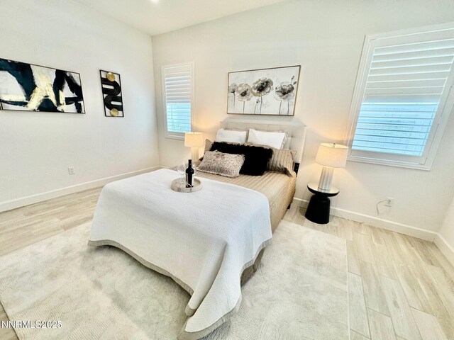 606 Braided Rope Dr, Reno, NV 89511 - bedroom featuring wood finished floors and baseboards