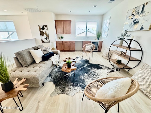 606 Braided Rope Dr, Reno, NV 89511 - living area with beverage cooler, light wood-type flooring, and recessed lighting