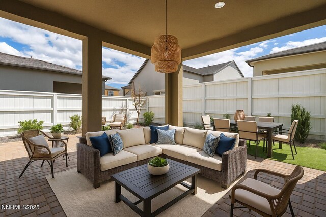 606 Braided Rope Dr, Reno, NV 89511 - view of patio / terrace featuring outdoor dining space and an outdoor hangout area