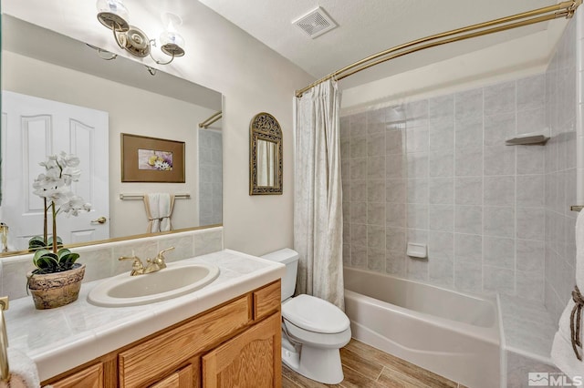 1871 Walnut Ct, Carson City, NV 89703 - full bath with toilet, shower / tub combo, vanity, and wood finished floors