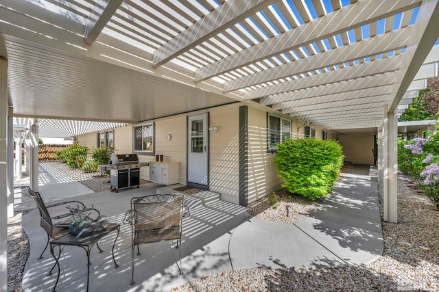 1871 Walnut Ct, Carson City, NV 89703 - view of patio featuring grilling area, a pergola, and fence