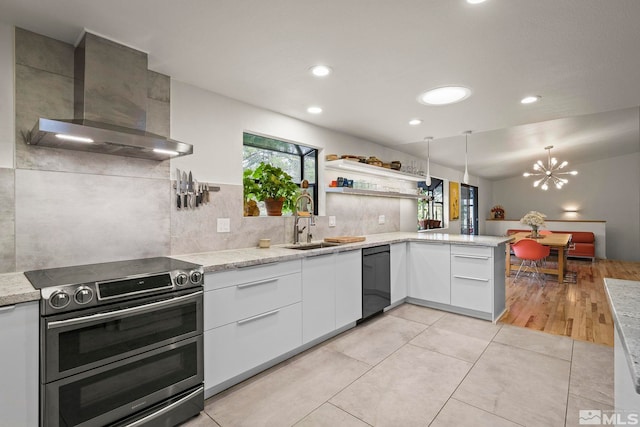 3255 Corey Dr, Reno, NV 89509 - kitchen featuring double oven range, wall chimney exhaust hood, modern cabinets, black dishwasher, and a sink