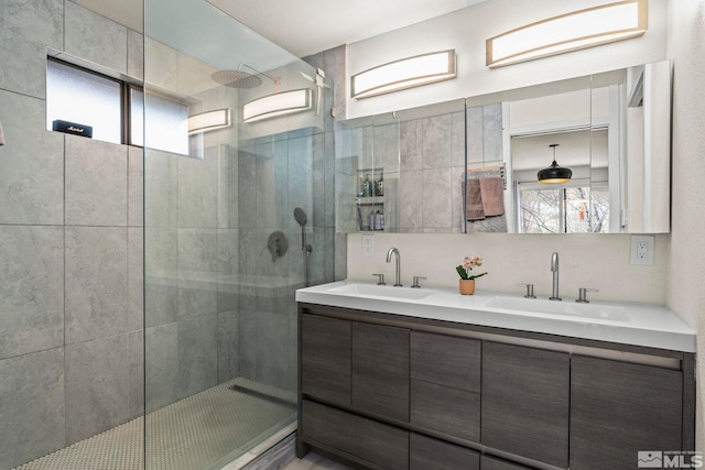 3255 Corey Dr, Reno, NV 89509 - full bathroom featuring walk in shower, double vanity, decorative backsplash, and tile walls
