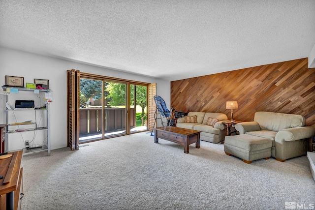 2012 Branch Ln, Reno, NV 89509 - carpeted living area with wooden walls, a textured ceiling, and an accent wall