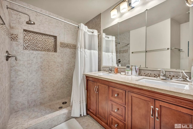 2012 Branch Ln, Reno, NV 89509 - bathroom featuring a tile shower and double vanity