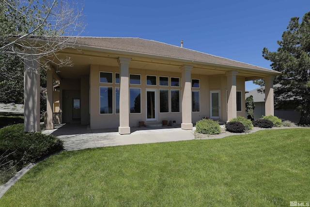 2459 Genoa Highlands, Genoa, NV 89411 - back of property featuring stucco siding, a yard, and a patio area