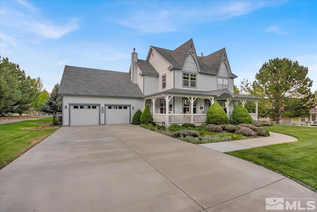 212 Foothill Meadows Ct, Genoa, NV 89411 - victorian-style house featuring a porch, a front yard, a garage, concrete driveway, and a chimney