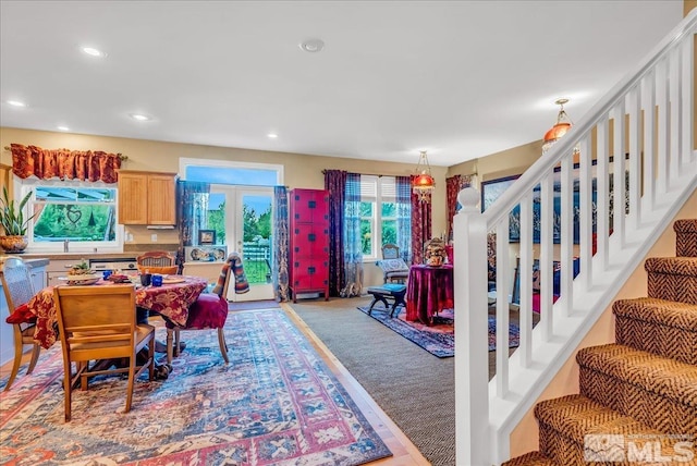 212 Foothill Meadows Ct, Genoa, NV 89411 - dining room with stairway, french doors, recessed lighting, and light colored carpet