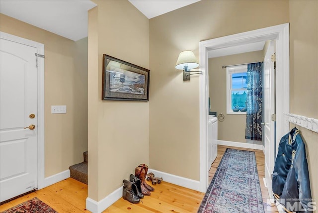 212 Foothill Meadows Ct, Genoa, NV 89411 - entryway featuring light wood-style flooring, stairway, and baseboards