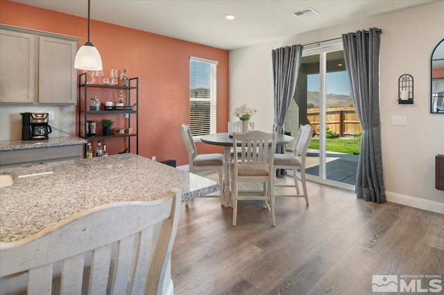 101 Cloud Berry Ct, Sparks, NV 89441 - dining area with plenty of natural light, light wood-style flooring, baseboards, and recessed lighting