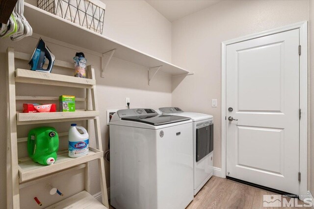 101 Cloud Berry Ct, Sparks, NV 89441 - laundry room with separate washer and dryer and light wood-type flooring