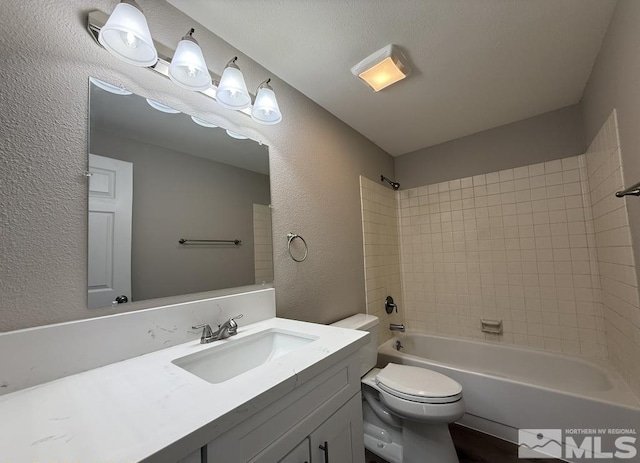 630 Wild Horse Way, Battle Mountain, NV 89820 - full bathroom with a textured wall, toilet, vanity, and bathtub / shower combination