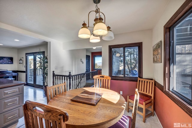 2820 Sagittarius Dr, Reno, NV 89509 - dining area featuring healthy amount of natural light, a chandelier, and baseboards