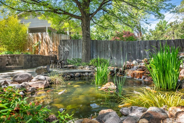 3295 Sunnyvale Ave, Reno, NV 89509 - view of yard with fence and a garden pond