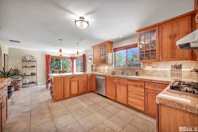 3295 Sunnyvale Ave, Reno, NV 89509 - kitchen featuring stainless steel appliances, a peninsula, a sink, decorative backsplash, and brown cabinets