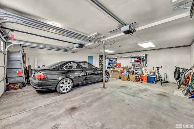 3295 Sunnyvale Ave, Reno, NV 89509 - garage featuring a garage door opener