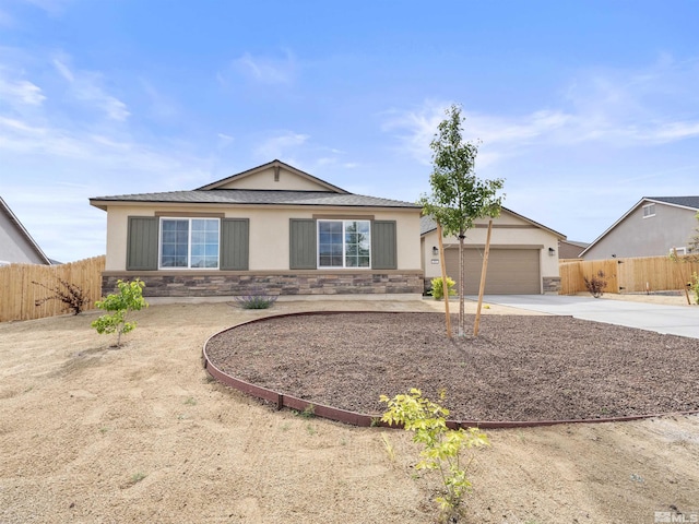 359 Bryce St, Dayton, NV 89403 - ranch-style home featuring stone siding, driveway, stucco siding, and fence