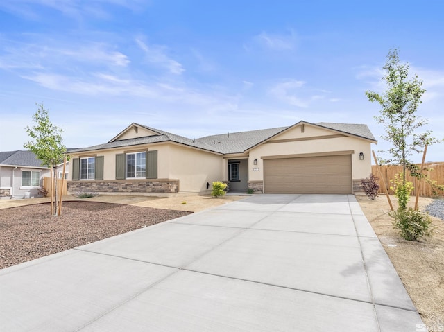 359 Bryce St, Dayton, NV 89403 - single story home with stone siding, stucco siding, fence, and concrete driveway