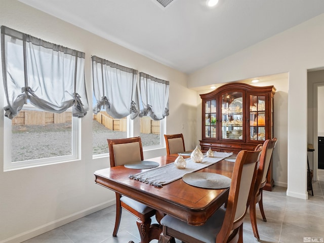 359 Bryce St, Dayton, NV 89403 - dining area with vaulted ceiling, baseboards, and light tile patterned floors