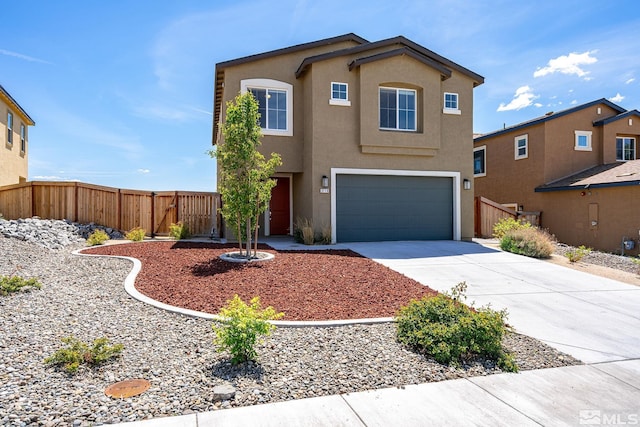traditional-style home with concrete driveway, stucco siding, fence, and a garage