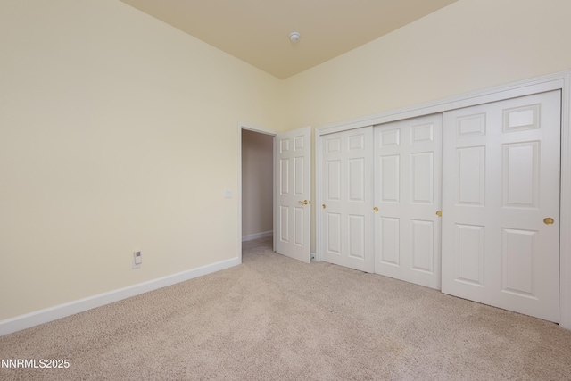 706 Norfolk Dr, Carson City, NV 89703 - unfurnished bedroom with light colored carpet and a closet