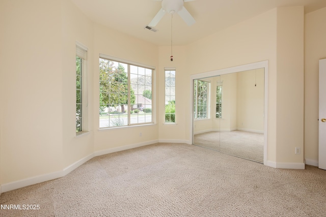 706 Norfolk Dr, Carson City, NV 89703 - carpeted empty room featuring plenty of natural light and ceiling fan