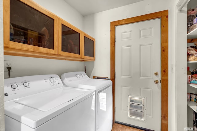 14865 N Red Rock Rd, Reno, NV 89508 - washroom with separate washer and dryer and cabinet space