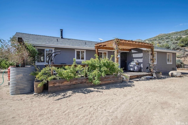 14865 N Red Rock Rd, Reno, NV 89508 - back of property featuring a pergola and a mountain view