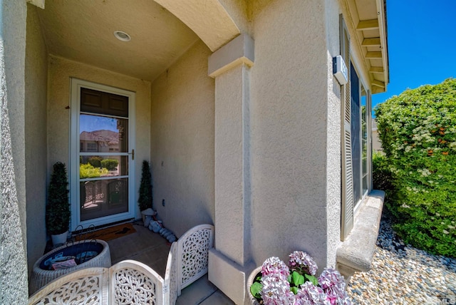 1230 Quail Run Dr, Carson City, NV 89701 - doorway to property with stucco siding